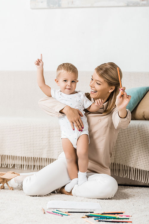 bigstock-Happy-Mother-And-Adorable-Todd-267470221