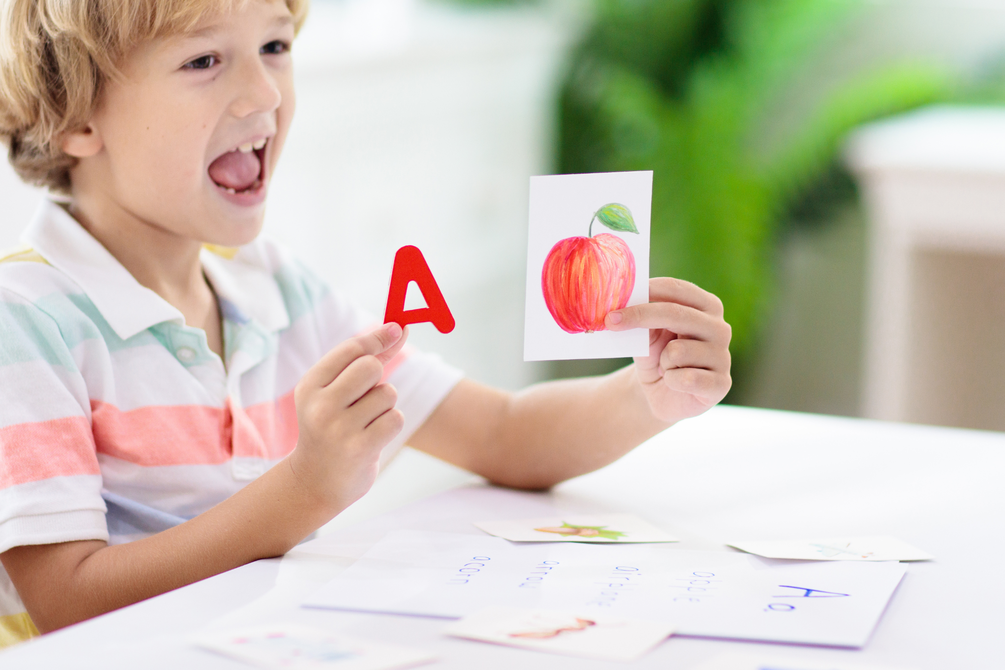 bigstock-Kid-Learning-To-Read-Phonics--427777892